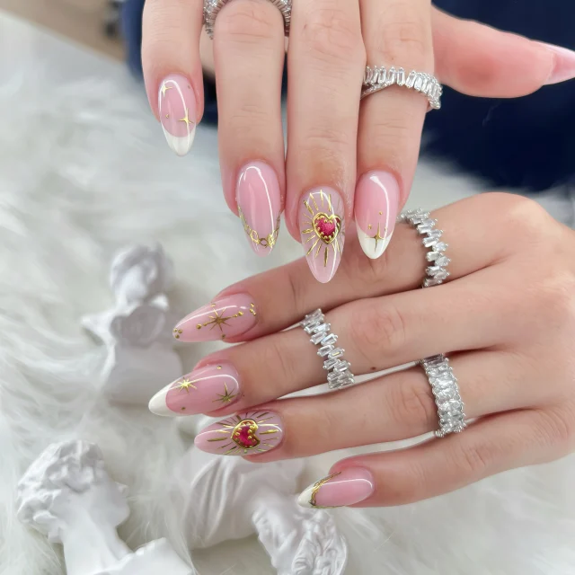 When your nails look like they belong in heaven ✨
Pink jelly base, white French tips & gold celestial details 🤍
