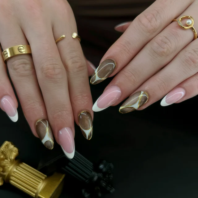 Rich tones, golden details & a touch of French 🤎✨
#nailsnailsnails #asthetics #elegant #naildesigns #insponails